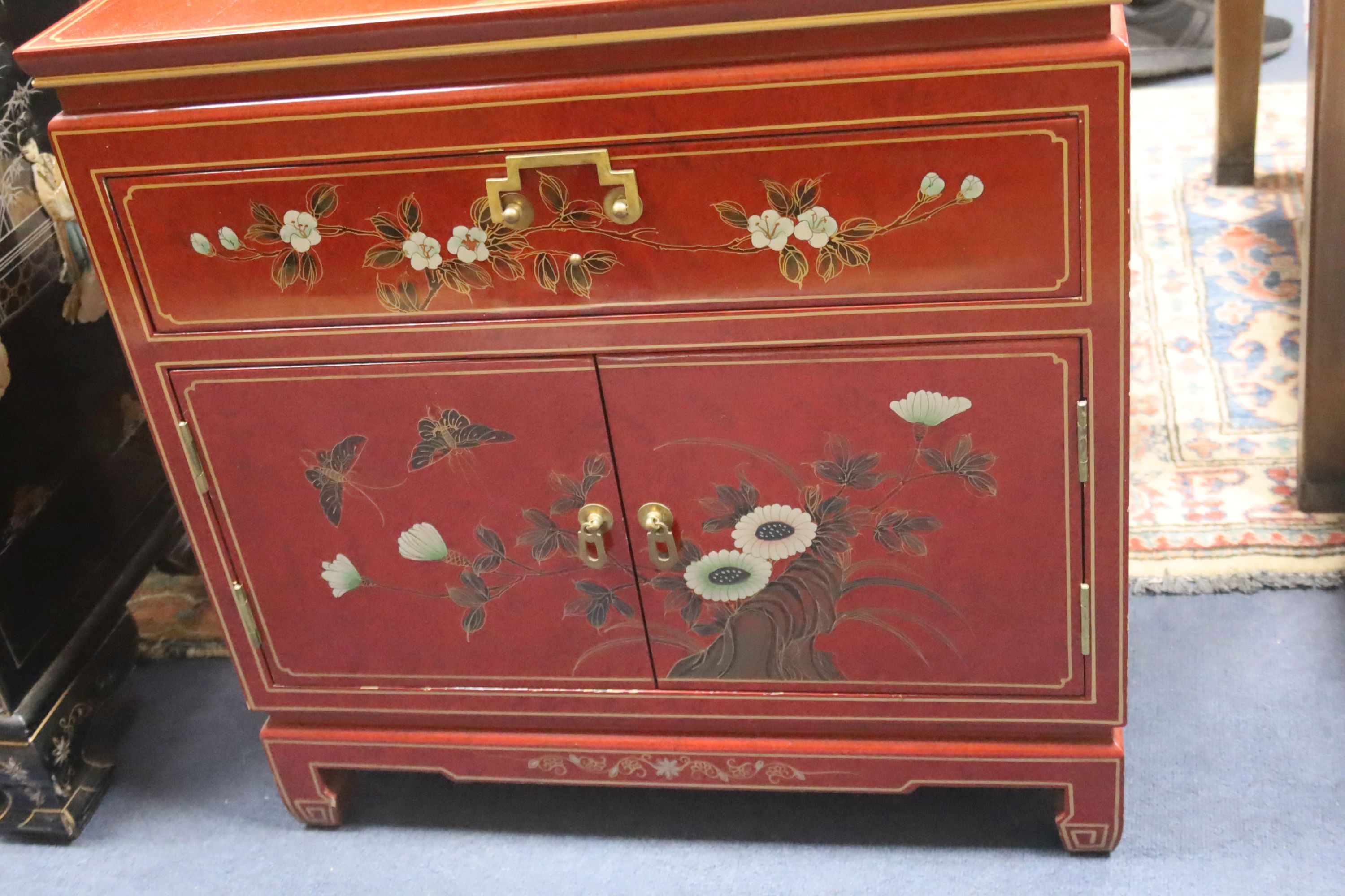 A Chinese black laquer chest of five drawers, a red lacquer chest and a cream lacquer coffee table